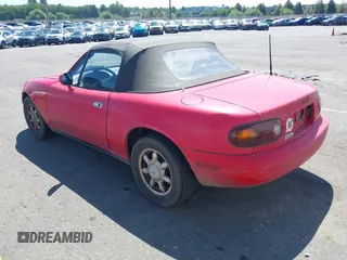 1993 Mazda MX-5 Miata with VIN JM1NA3513P0414468, listed as a IAAI auction lot 42653718 with 292,497 mi miles and . Bid and sale history available at DreamBid. Image 3.