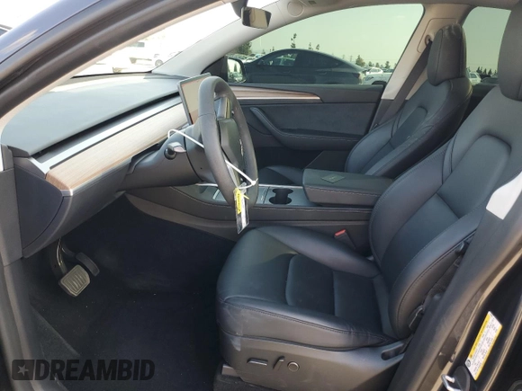 2024 Tesla Model Y Long Range with VIN 7SAYGAEE0RF018427, listed as a Copart auction lot 42455075 with 13,347 mi miles and Salvage Title. Bid and sale history available at DreamBid. Image 7.