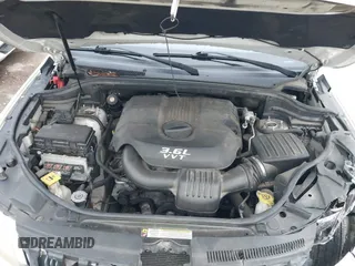 2012 Jeep Grand Cherokee Laredo with VIN 1C4RJFAG5CC224032, listed as a IAAI auction lot 42069334 with 106,614 mi miles. Bid and sale history available at carsss.com. Image 10.