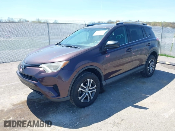 2016 Toyota RAV4 LE with VIN 2T3ZFREV4GW284902, listed as a IAAI auction lot 42054633 with 117,463 mi miles and . Bid and sale history available at carsss.com. Image 2.