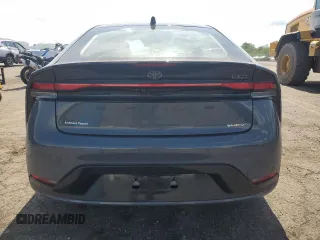 2024 Toyota Prius LE z VIN JTDADABU4R3021525, wystawiony jako Copart lot #61652045 z przebiegiem 2 120 mil mil oraz Szkoda całkowita • Salvage title. Historia ofert i sprzedaży dostępna na DreamBid. Obrazek 6.
