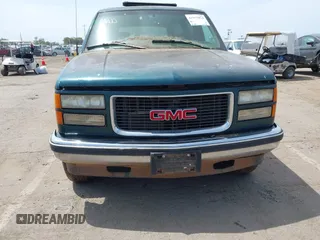 1997 GMC Suburban z VIN 1GKFK16R5VJ748880, wystawiony jako IAAI lot #41975824 z przebiegiem 302 899 mil mil oraz . Historia ofert i sprzedaży dostępna na DreamBid. Obrazek 6.
