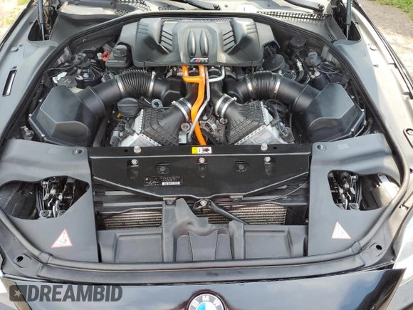2014 BMW M6 z VIN WBSLX9C54ED160430, wystawiony jako Copart lot #66270794 z przebiegiem 92 025 mil mil oraz Szkoda całkowita • Salvage title. Historia ofert i sprzedaży dostępna na DreamBid. Obrazek 11.