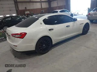 2016 Maserati Ghibli S Q4 с VIN ZAM57RTA6G1173547, выставлен на аукционе IAAI как лот 41823427 с пробегом 70 506 миль миль и . История ставок и продаж доступна на DreamBid. Изображение 4.