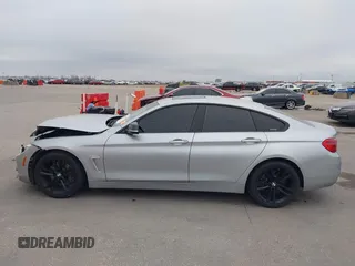 2018 BMW 4 Series 440i with VIN WBA4J5C57JBF07924, listed as a IAAI auction lot 41595682 with 75,121 mi miles and . Bid and sale history available at DreamBid. Image 14.