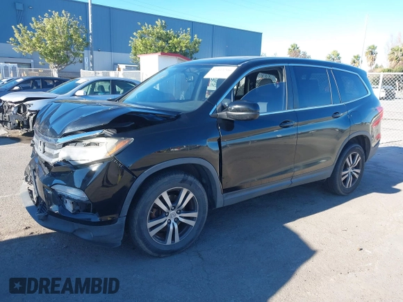 2018 Honda Pilot EX-L with VIN 5FNYF5H58JB013113, listed as a IAAI auction lot 41313206 with 125,825 mi miles. Bid and sale history available at carsss.com. Image 17.