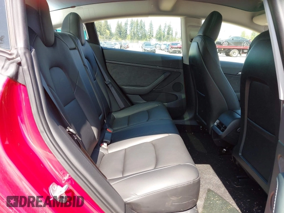 2023 Tesla Model 3 Long Range with VIN 5YJ3E1EBXPF603421, listed as a IAAI auction lot 42105037 with 13,186 mi miles and . Bid and sale history available at DreamBid. Image 8.