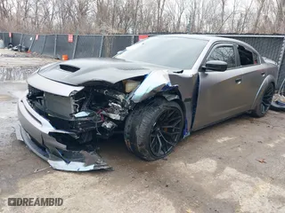 2020 Dodge Charger Scat Pack with VIN 2C3CDXGJ7LH157411, listed as a IAAI auction lot 41226695 with 52,108 mi miles. Bid and sale history available at carsss.com. Image 2.
