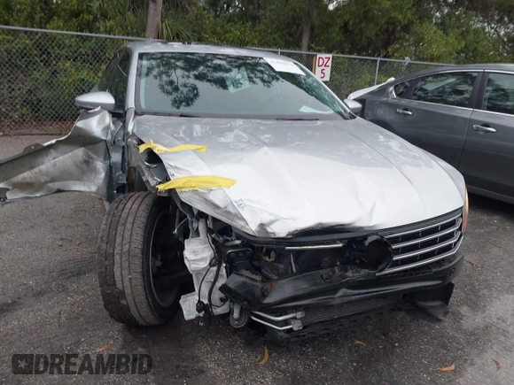 2019 Volkswagen Passat 2.0T Wolfsburg Edition with VIN 1VWLA7A3XKC007385, listed as a IAAI auction lot 41409014 with 36,208 mi miles. Bid and sale history available at carsss.com. Image 6.