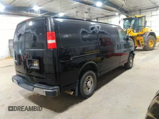 2018 Chevrolet Express Cargo Van with VIN 1GCWGAFP5J1185884, listed as a IAAI auction lot 40386466 with 1 mi miles. Bid and sale history available at carsss.com. Image 4.