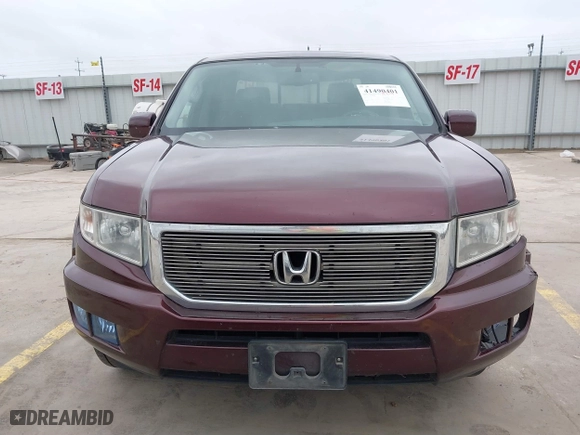 2014 Honda Ridgeline RTL with VIN 5FPYK1F52EB010700, listed as a IAAI auction lot 41490401 with 180,947 mi miles. Bid and sale history available at carsss.com. Image 12.