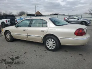 2001 Lincoln Continental with VIN 1LNHM97V71Y711352, listed as a Copart auction lot 46235305 with 122,786 mi miles and Salvage Title. Bid and sale history available at DreamBid. Image 2.