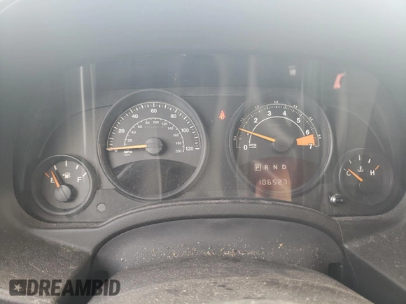 2015 Jeep Patriot Latitude with VIN 1C4NJPFBXFD281214, listed as a Copart auction lot 87883615 with 106,402 mi miles and Salvage Title. Bid and sale history available at DreamBid. Image 9.