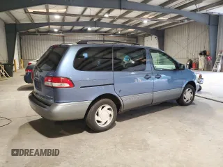 2002 Toyota Sienna LE with VIN 4T3ZF13C42U437712, listed as a Copart auction lot 64836245 with 151,693 mi miles and Salvage title. Bid and sale history available at DreamBid. Image 3.