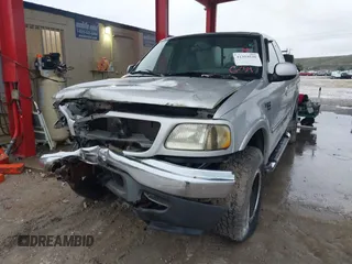 2003 Ford F-150 XL with VIN 1FTRX18W53NA09107, listed as a IAAI auction lot 41394520 with 187,489 mi miles. Bid and sale history available at carsss.com. Image 2.