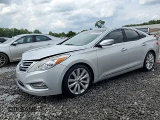 2014 Hyundai Azera Limited с VIN KMHFH4JG1EA376452, выставлен на аукционе Copart как лот 59703095 с пробегом 124 801 миль миль и Списание • Salvage title. История ставок и продаж доступна на DreamBid. Изображение 1.