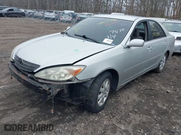 2003 Toyota Camry LE with VIN 4T1BE30K73U704489, listed as a IAAI auction lot 41905778 with Not Provided miles and . Bid and sale history available at DreamBid. Image 2.