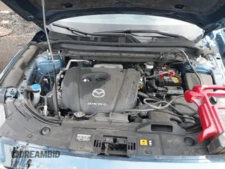 2020 Mazda CX-5 Grand Touring with VIN JM3KFADM4L0827733, listed as a IAAI auction lot 41482517 with 43,597 mi miles. Bid and sale history available at carsss.com. Image 10.