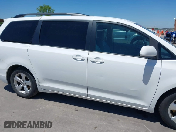 2011 Toyota Sienna LE AAS with VIN 5TDKK3DC1BS150109, listed as a IAAI auction lot 42067808 with 186,811 mi miles and . Bid and sale history available at DreamBid. Image 6.