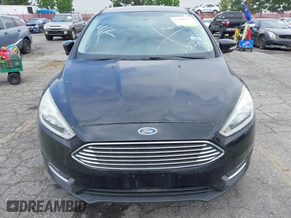 2017 Ford Focus Titanium with VIN 1FADP3N2XHL230766, listed as a IAAI auction lot 42386275 with 64,138 mi miles and . Bid and sale history available at DreamBid. Image 6.