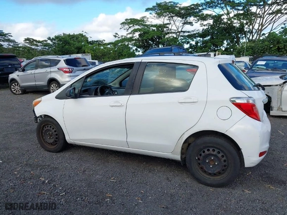 2014 Toyota Yaris L with VIN JTDKTUD39ED586791, listed as a IAAI auction lot 40958187 with 105,143 mi miles. Bid and sale history available at carsss.com. Image 14.