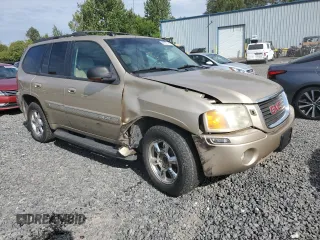 2005 GMC Envoy SLT with VIN 1GKDS13S552135280, listed as a Copart auction lot 68097344 with 165,924 mi miles and Salvage Title. Bid and sale history available at carsss.com. Image 4.