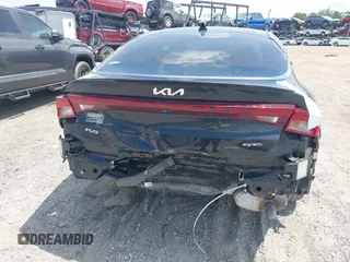 2022 Kia K5 GT-Line z VIN 5XXG64J29NG164454, wystawiony jako IAAI lot #42102282 z przebiegiem 43 367 mil mil oraz . Historia ofert i sprzedaży dostępna na DreamBid. Obrazek 6.