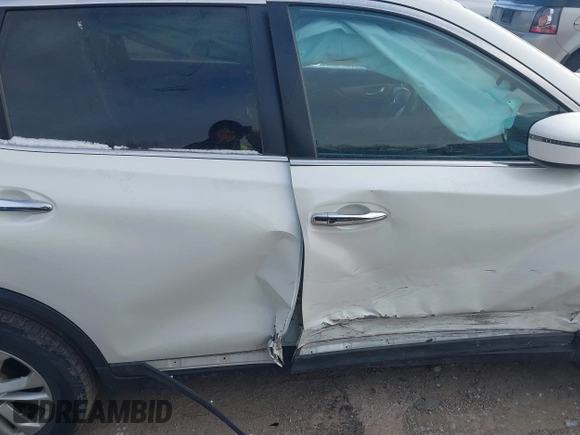 2016 Nissan Rogue S with VIN KNMAT2MT1GP648671, listed as a IAAI auction lot 41084406 with 97,275 mi miles and . Bid and sale history available at DreamBid. Image 13.