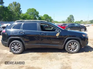 2019 Jeep Cherokee Latitude Plus z VIN 1C4PJLLBXKD123116, wystawiony jako IAAI lot #41981044 z przebiegiem 173 232 mil mil oraz . Historia ofert i sprzedaży dostępna na DreamBid. Obrazek 6.