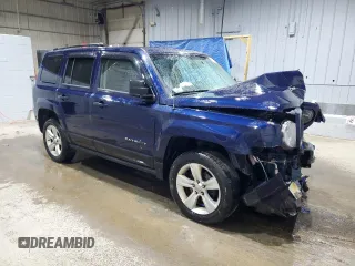 2014 Jeep Patriot Latitude with VIN 1C4NJRFB0ED852882, listed as a Copart auction lot 49674915 with 130,367 mi miles and Salvage title. Bid and sale history available at DreamBid. Image 4.