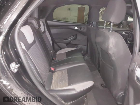 2014 Ford Focus ST with VIN 1FADP3L96EL355713, listed as a IAAI auction lot 41572939 with 102,838 mi miles and . Bid and sale history available at carsss.com. Image 8.