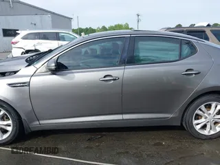 2013 Kia Optima EX z VIN 5XXGN4A71DG130926, wystawiony jako IAAI lot #42080433 z przebiegiem 197 900 mil mil oraz . Historia ofert i sprzedaży dostępna na DreamBid. Obrazek 14.