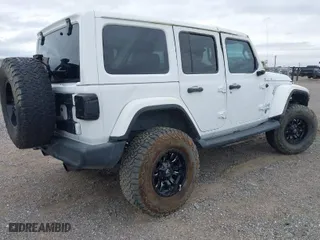 2019 Jeep Wrangler Unlimited Sport with VIN 1C4HJXDG0KW505973, listed as a IAAI auction lot 41736235 with 118,867 mi miles. Bid and sale history available at carsss.com. Image 4.