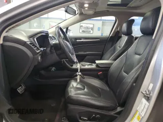 2017 Ford Fusion Hybrid Titanium z VIN 3FA6P0RU1HR300370, wystawiony jako Copart lot #65206605 z przebiegiem 150 424 mil mil oraz Czysty tytuł • Clean title. Historia ofert i sprzedaży dostępna na DreamBid. Obrazek 7.