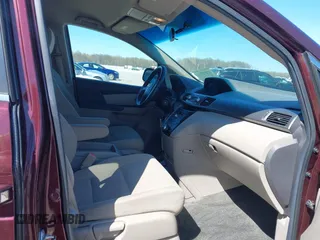 2012 Honda Odyssey EX with VIN 5FNRL5H42CB136915, listed as a IAAI auction lot 41972714 with 211,729 mi miles and . Bid and sale history available at carsss.com. Image 5.