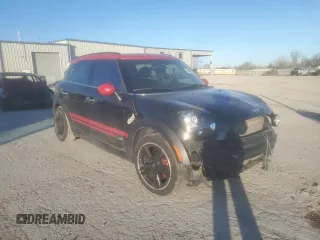2015 MINI Countryman John Cooper Works with VIN WMWXD1C5XFWS34732, listed as a Copart auction lot 42402185 with Not Provided miles and Salvage Title. Bid and sale history available at DreamBid. Image 4.