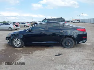 2015 Kia Optima EX with VIN 5XXGN4A75FG357829, listed as a IAAI auction lot 42302163 with 115,277 mi miles and . Bid and sale history available at DreamBid. Image 14.