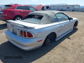 1998 Ford Mustang with VIN 1FAFP4444WF188494, listed as a IAAI auction lot 42158252 with 127,702 mi miles and . Bid and sale history available at DreamBid. Image 4.