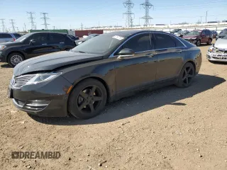 2015 Lincoln MKZ z VIN 3LN6L2GK1FR613074, wystawiony jako Copart lot #52157775 z przebiegiem 118 144 mil mil oraz Szkoda całkowita • Salvage title. Historia ofert i sprzedaży dostępna na DreamBid. Obrazek 1.