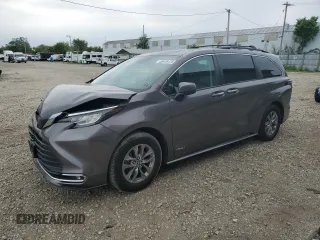 2021 Toyota Sienna XLE with VIN 5TDJSKFC7MS011317, listed as a Copart auction lot 60635475 with 88,148 mi miles and Salvage title. Bid and sale history available at DreamBid. Image 1.