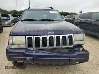1998 Jeep Grand Cherokee with VIN 1J4FX48S1WC244308, listed as a Copart auction lot 74384714 with Not provided miles and Non repairable. Bid and sale history available at DreamBid. Image 5.