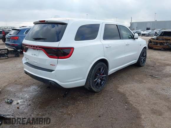 2018 Dodge Durango SRT with VIN 1C4SDJGJ4JC341550, listed as a IAAI auction lot 41525295 with 86,503 mi miles and . Bid and sale history available at DreamBid. Image 4.