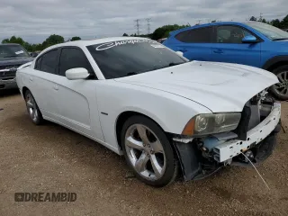 2012 Dodge Charger RT with VIN 2C3CDXCT2CH239697, listed as a Copart auction lot 54951124 with 144,692 mi miles and Salvage Title. Bid and sale history available at DreamBid. Image 4.