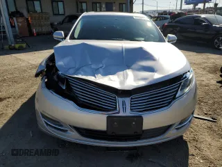 2015 Lincoln MKZ z VIN 3LN6L2G9XFR610736, wystawiony jako Copart lot #80662274 z przebiegiem 101 441 mil mil oraz Szkoda całkowita • Salvage title. Historia ofert i sprzedaży dostępna na DreamBid. Obrazek 5.