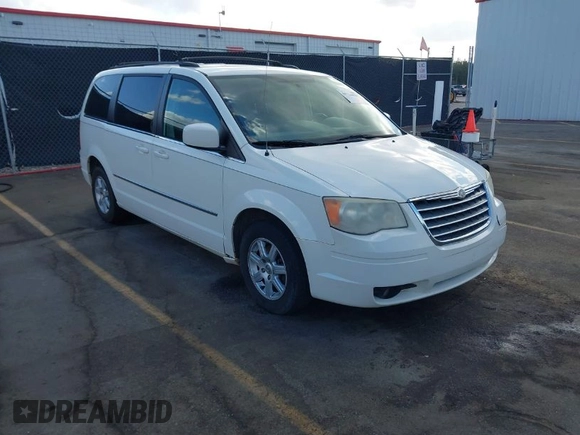 2010 Chrysler Town & Country Touring with VIN 2A4RR5DX4AR435106, listed as a IAAI auction lot 40726036 with 241,470 mi miles. Bid and sale history available at carsss.com. Image 1.