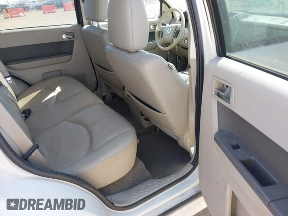 2010 Mercury Mariner Premier with VIN 4M2CN8HG5AKJ07771, listed as a IAAI auction lot 41779514 with 187,786 mi miles and . Bid and sale history available at DreamBid. Image 8.