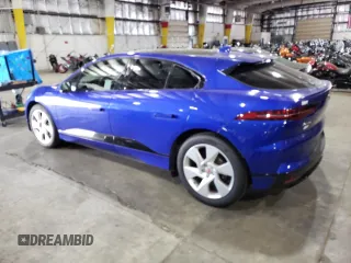 2019 Jaguar I-Pace SE z VIN SADHC2S19K1F63743, wystawiony jako Copart lot #61911943 z przebiegiem 33 776 mil mil oraz . Historia ofert i sprzedaży dostępna na DreamBid. Obrazek 2.