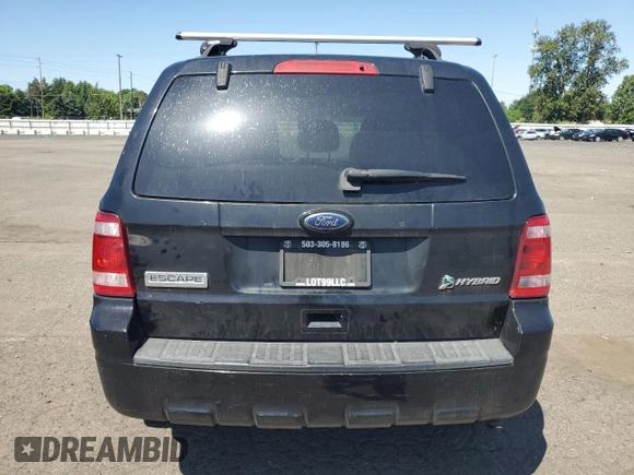 2010 Ford Escape Hybrid with VIN 1FMCU4K38AKC98072, listed as a Copart auction lot 58192375 with 123,958 mi miles and Salvage title. Bid and sale history available at DreamBid. Image 6.