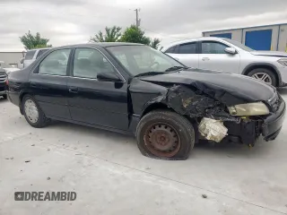 2001 Toyota Camry CE z VIN 4T1BG22K71U032545, wystawiony jako Copart lot #60883095 z przebiegiem 199 864 mil mil oraz Czysty tytuł • Clean title. Historia ofert i sprzedaży dostępna na DreamBid. Obrazek 4.