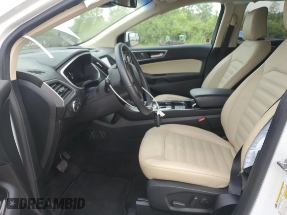 2020 Ford Edge SEL z VIN 2FMPK4J95LBB21392, wystawiony jako Copart lot #60912275 z przebiegiem 82 527 mil mil oraz Szkoda całkowita • Salvage title. Historia ofert i sprzedaży dostępna na DreamBid. Obrazek 7.